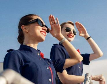 Why Do Flight Attendants Sit on Their Hands Sometimes?